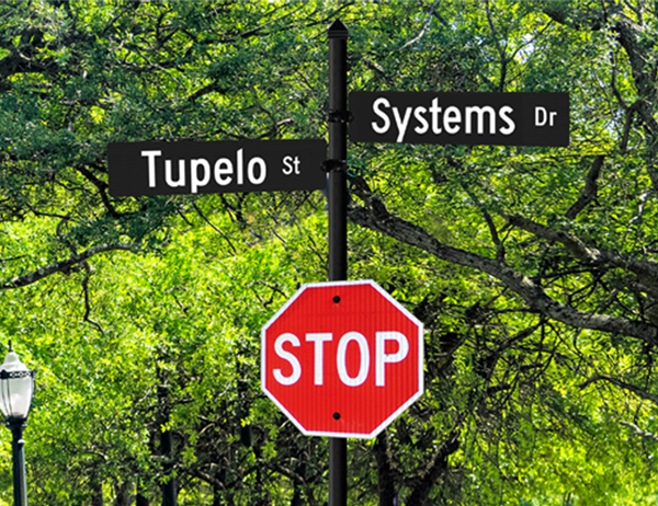Tupelo Street Name System with Street Name Signs and Stop Sign