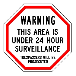Warning This Area Is Under 24 Hour Surveillance Trespassers Will Be Prosecuted Sign