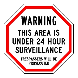 Warning This Area Is Under 24 Hour Surveillance Trespassers Will Be Prosecuted Sign