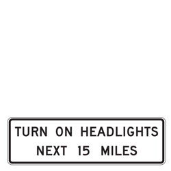 Turn on Headlights Next XX Miles Sign