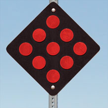 Type 4 (End of Roadway) Object Markers: Black with Red Reflective Circles