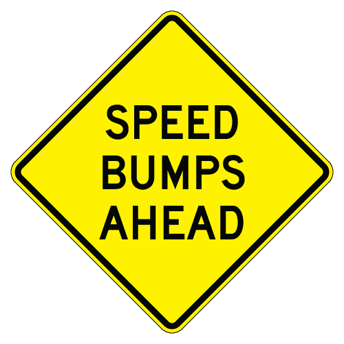 Speed Bumps Ahead Warning Sign