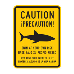 Caution | Swim At Your Own Risk (Spanish) Sign