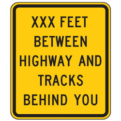 XXX Feet Between Highway and Tracks Behind You Advance Warning Signs
